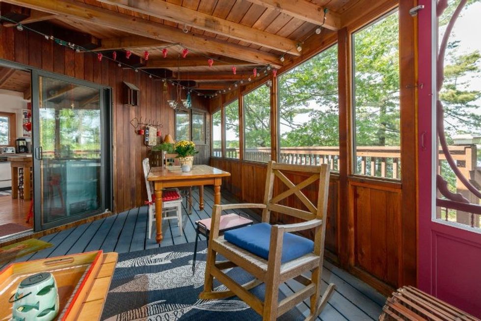 11 screened porch dining area