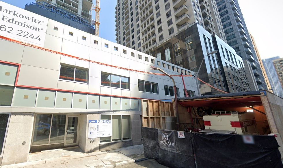 19 Bloor Street West and the Amherst concrete pump on Balmuto Street, as of September 2023.