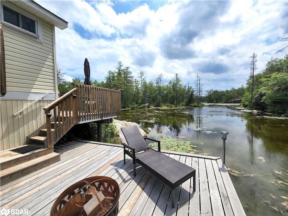 This Island Cottage in the Kawartha Lakes Brings a New Meaning to ...