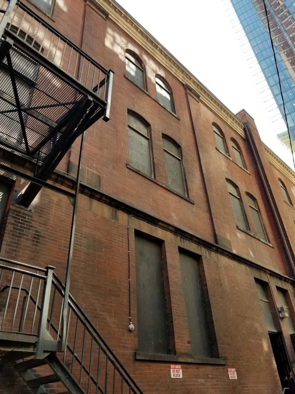 4 boarded up stainglass windows 768x1024