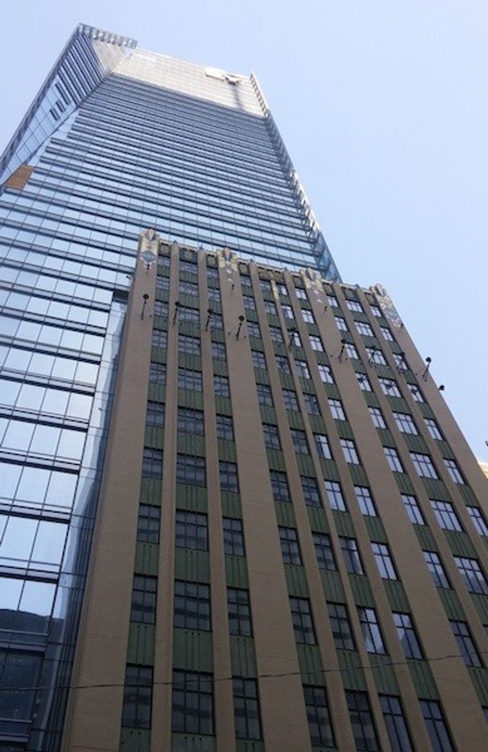 4 the melding of the concourse building facade into the ey tower