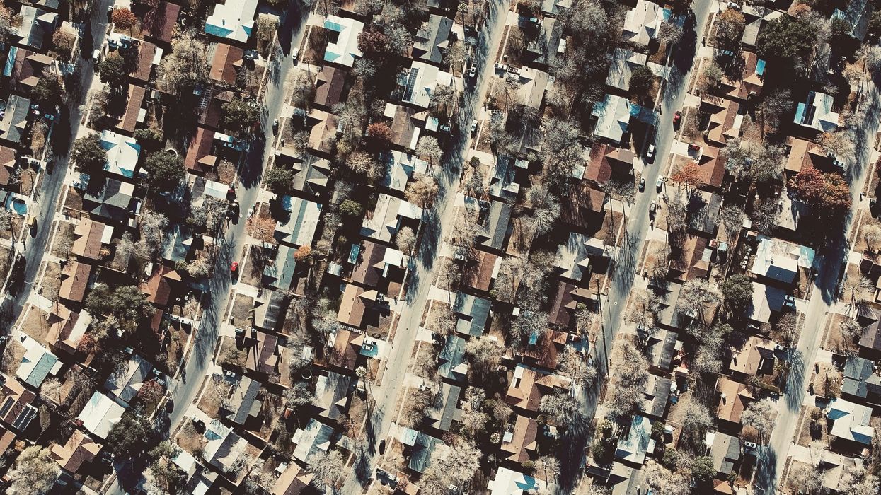 a bird's eye view of a city with lots of houses