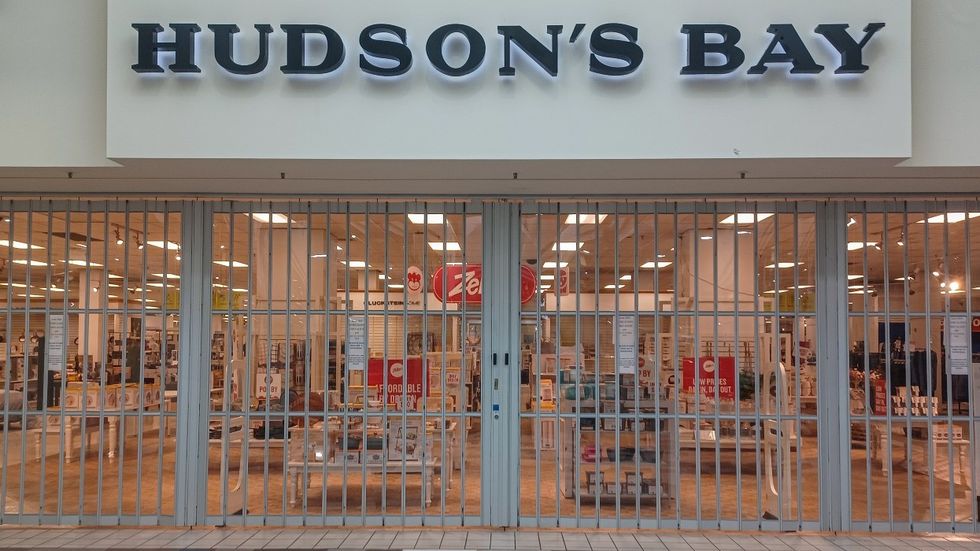 A Hudson's Bay store with its gate closed.