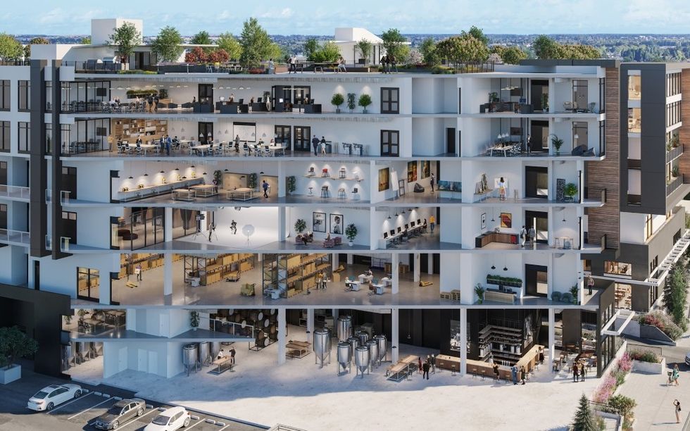 A rendering of Marine Landing, with office space above different kinds of industrial space.