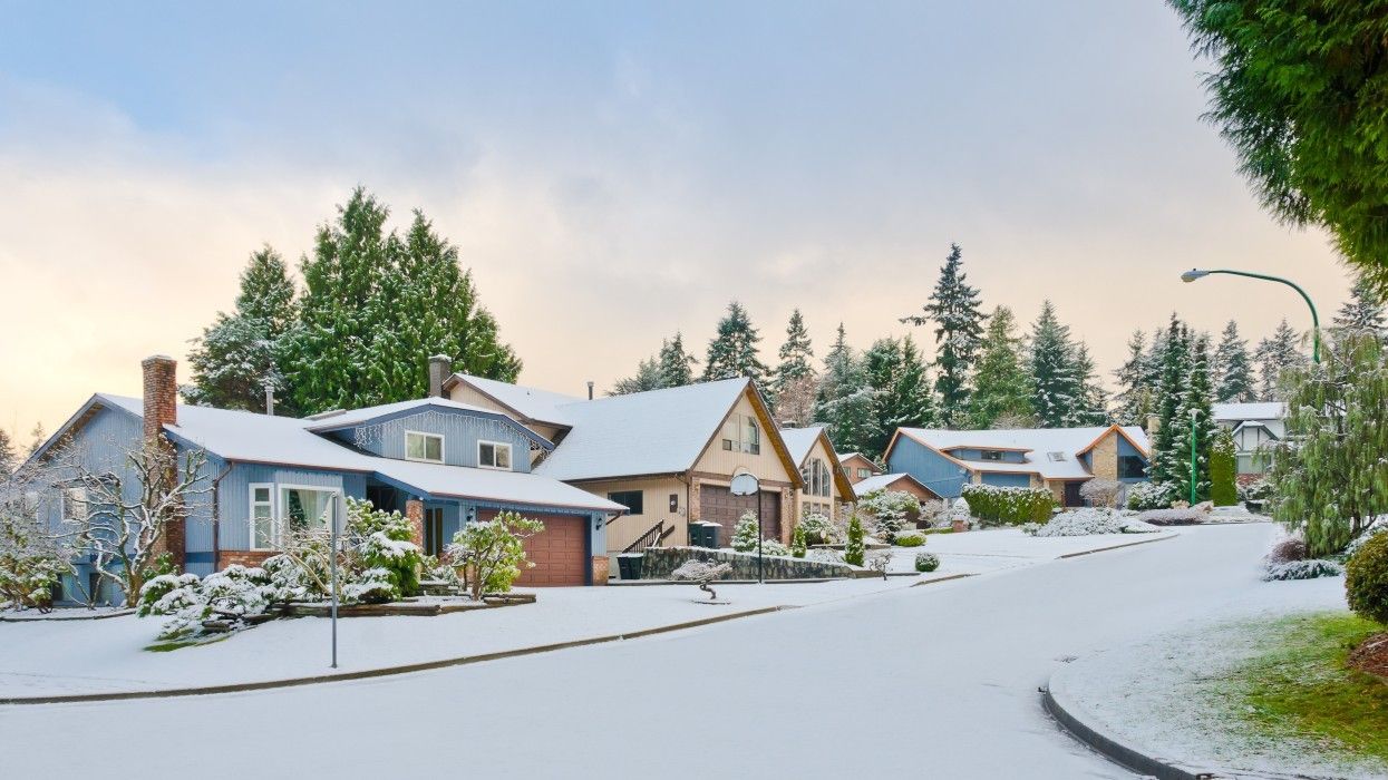 A residential street in Vancouver covered in snow.