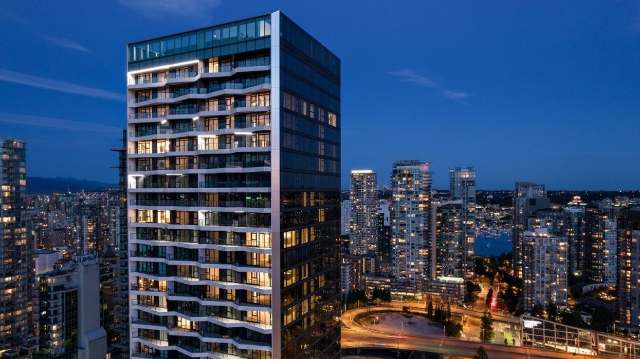 A skyline of Vancouver at night, featuring The Pacific.