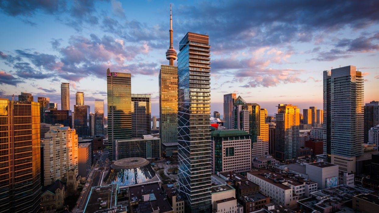 A view of downtown Toronto and the CN Tower at sunset.