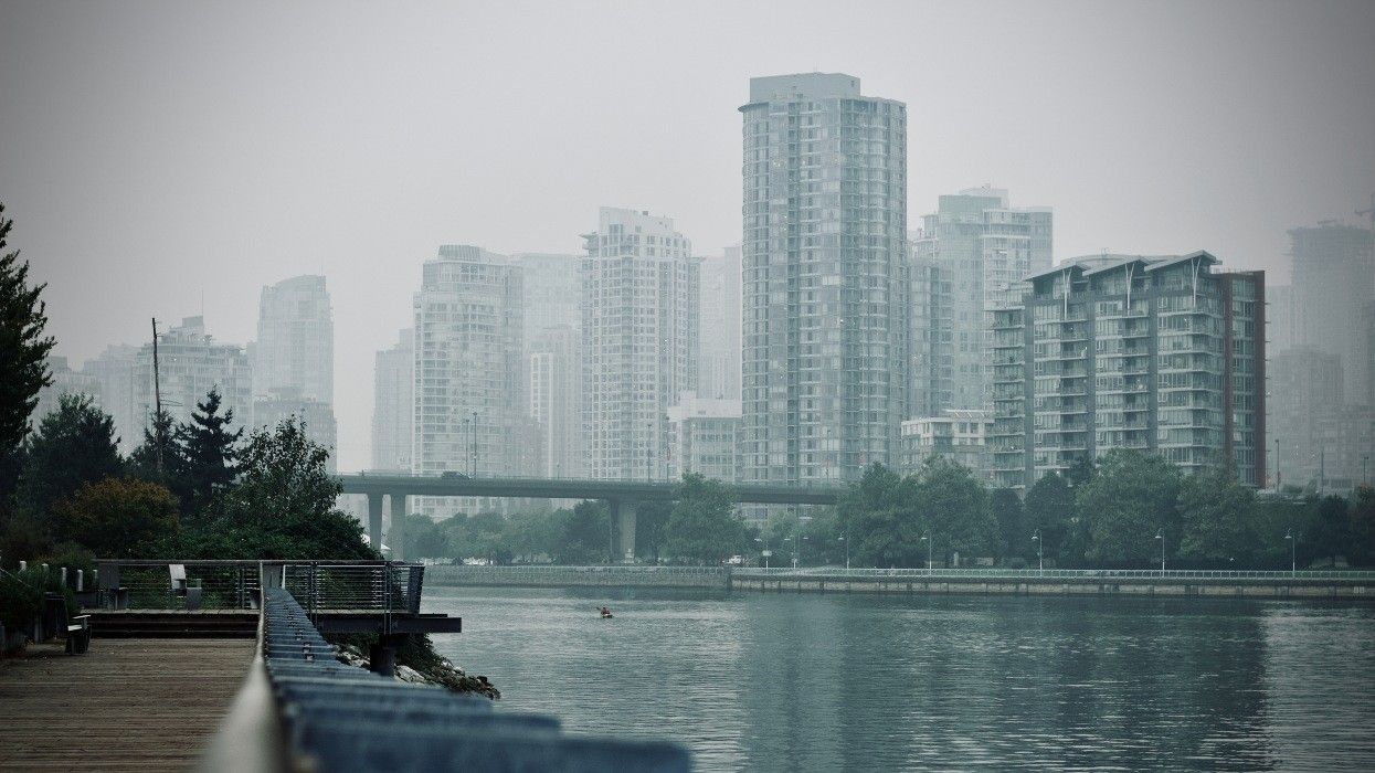 A view of high-rises in Vancouver on a foggy day.