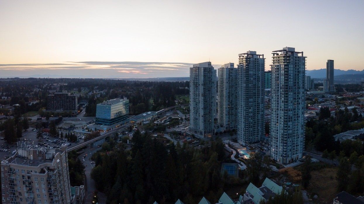Aerial view of Surrey Central and four high-rise buildings.