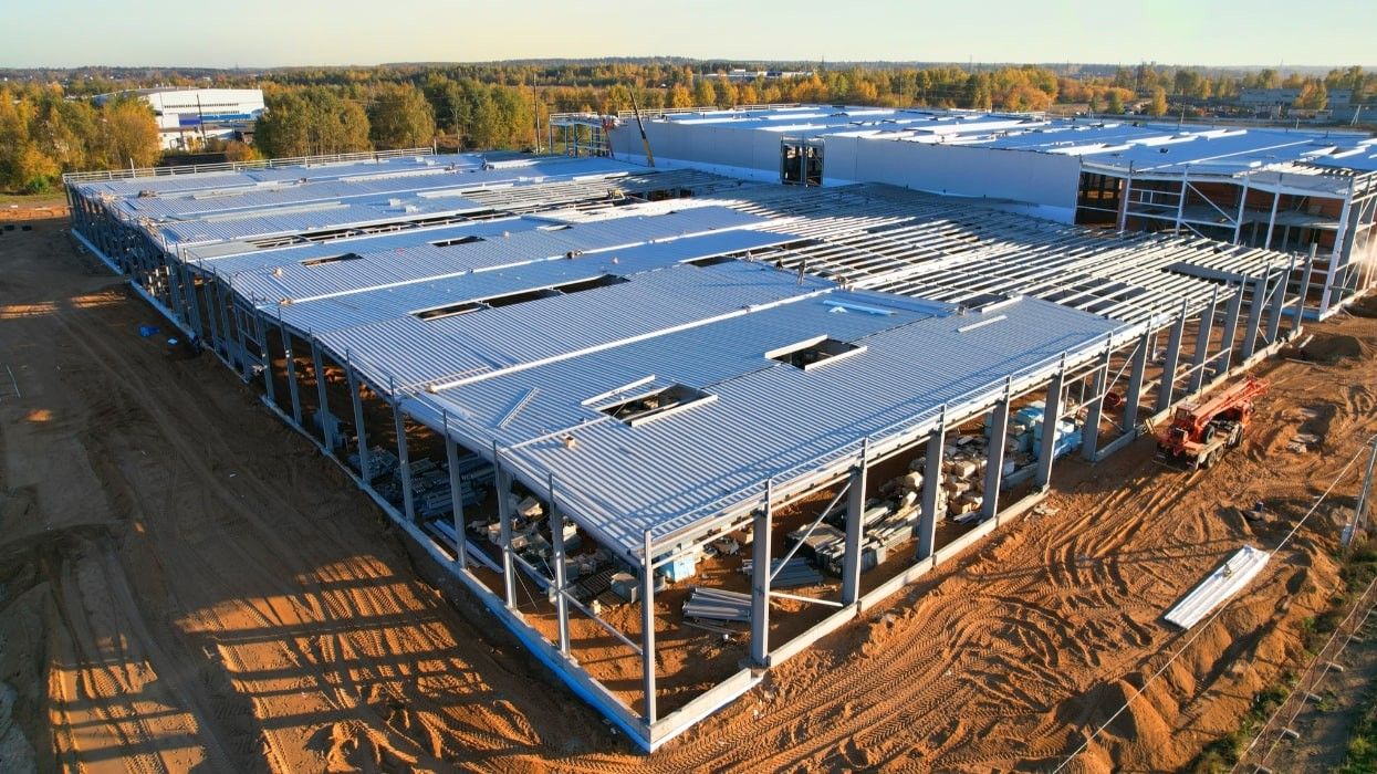 An industrial warehouse under construction.