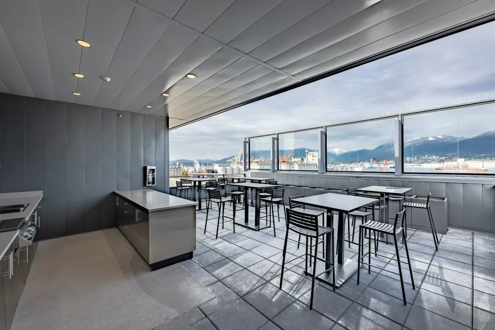 An outdoor kitchen and dining space at Ironworks.