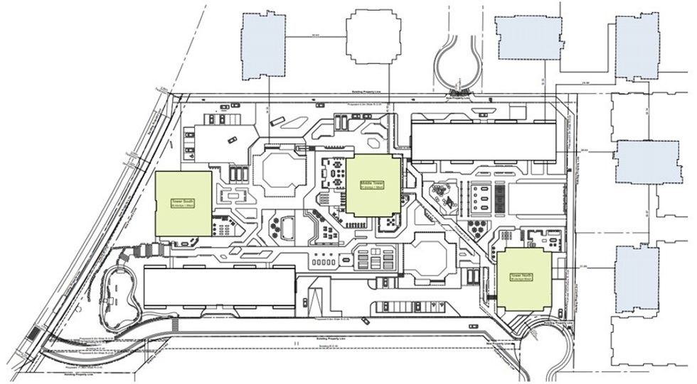 An overview of Lougheed Village, looking west, and the new proposed infill towers (yellow).