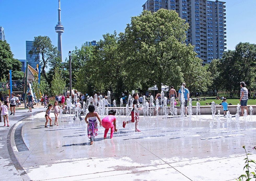 Children playing in Grange Park, one of the busiest parks in the city. This photo was taken at the community event celebrating its completion. (Photo courtesy by Art Gallery of Ontario)