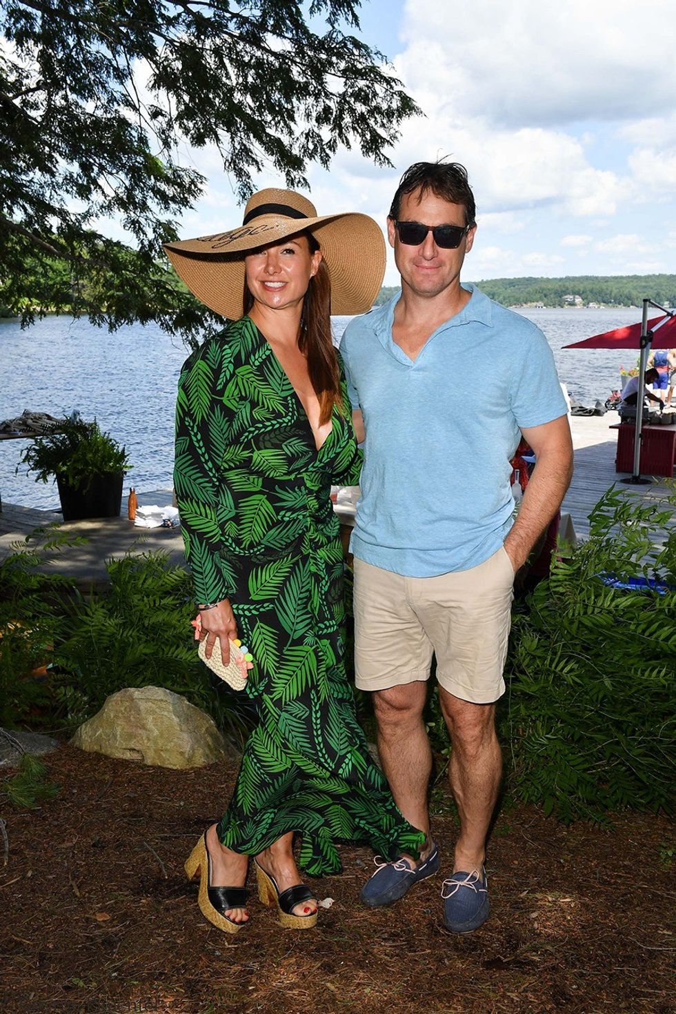 Cottage owners and dock party hosts, Tamara Bahry and Rob White. (Photo by George Pimentel for Commission Yourself)