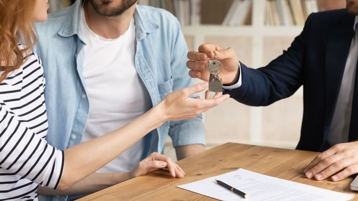 Couple signing a mortgage contract