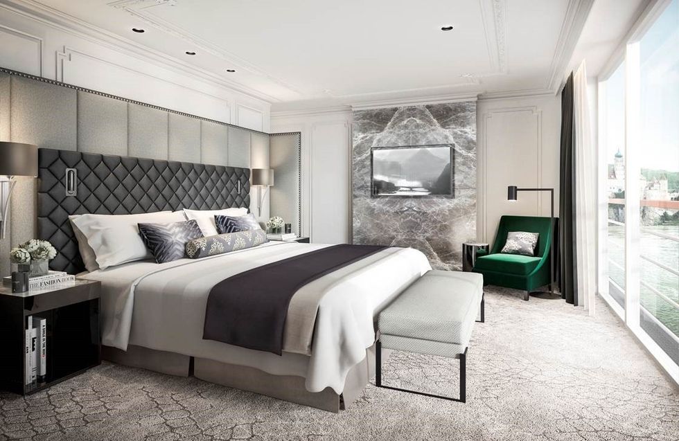 Crystal Cruises penthouse suite bedroom that demonstrates how technology from ships can be incorporated in home design, by placing USB chargers in bedside tables.