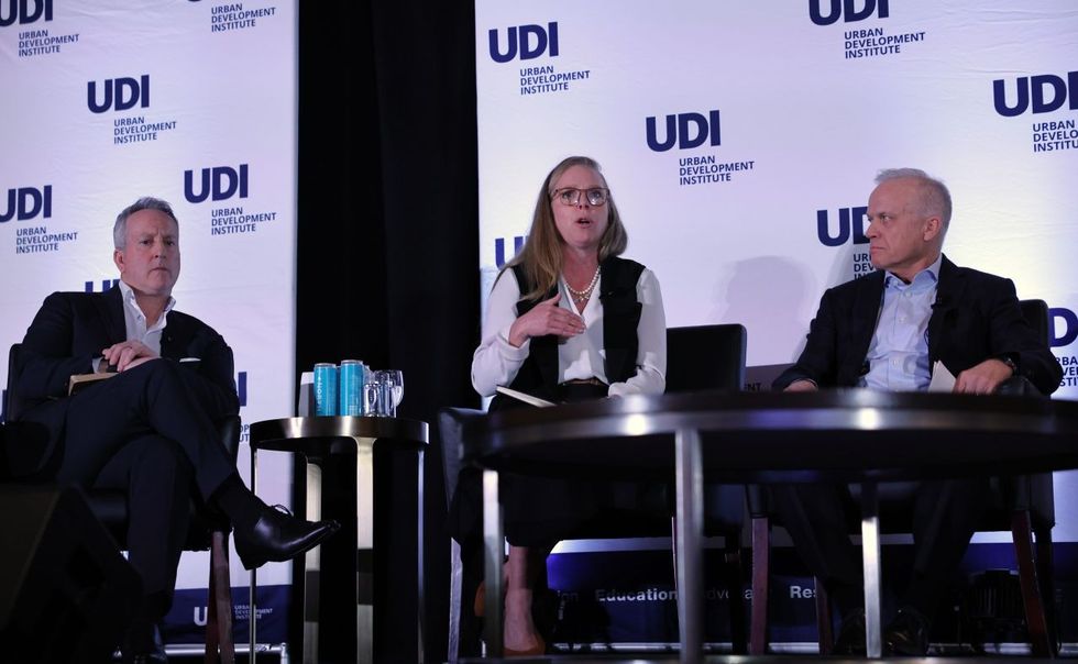 Daryl Simpson, Jennifer Podmore Russell, and Eric Carlson at the UDI luncheon on January 23.
