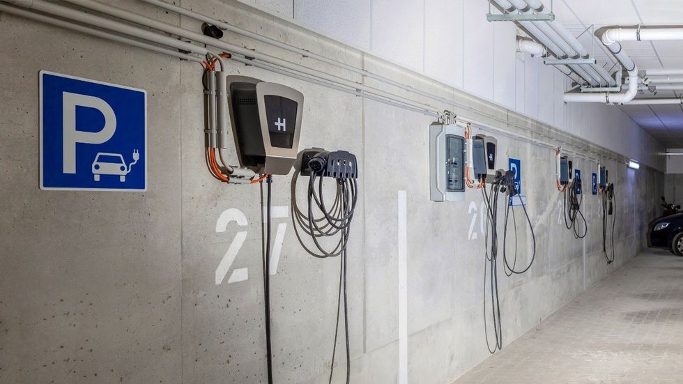 EV charging stalls in an underground parkade.