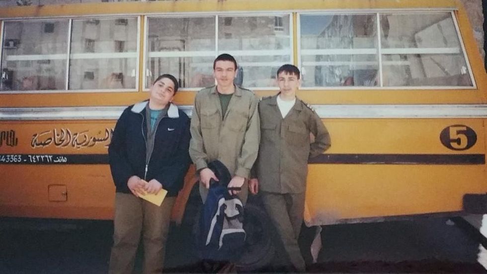 From left to right myself aren and miro this is us at karen yeppe armenian secondary school in grade 9 in aleppo syria