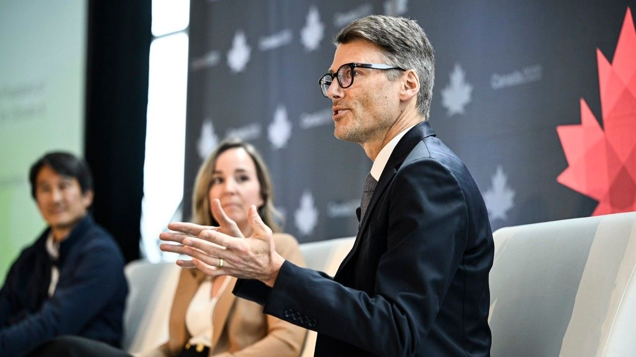 Gregor Robertson speaking at the Net Zero Leadership Summit in 2023.