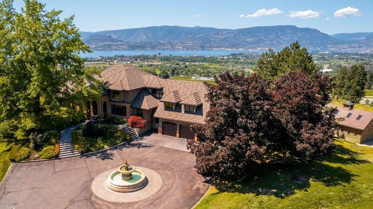 Home with water and mountain views in background