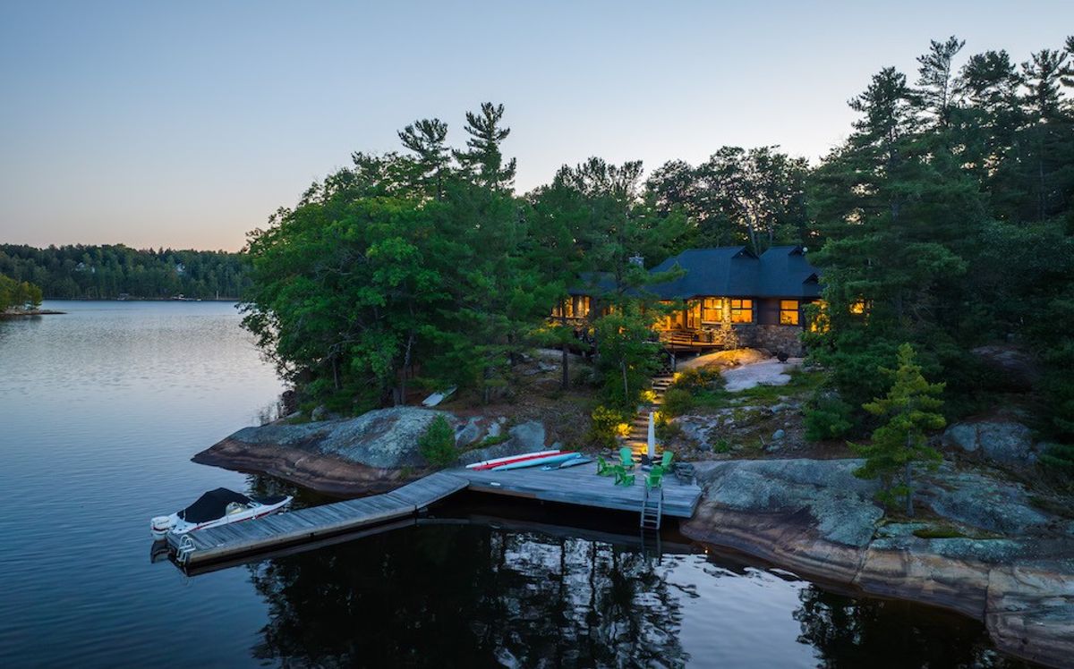 This Serene Lakeside Property Places Nature At Centre Stage