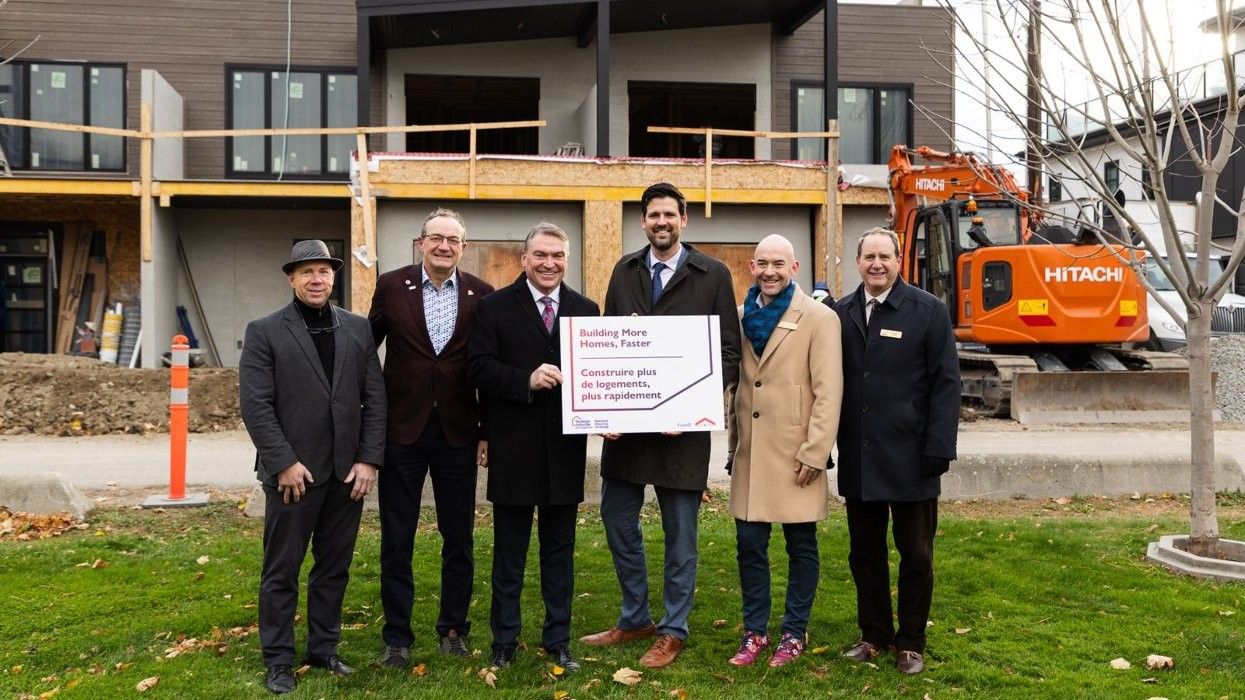 Mayor Tom Dyas, Minister of Housing Sean Fraser, and others in Kelowna.