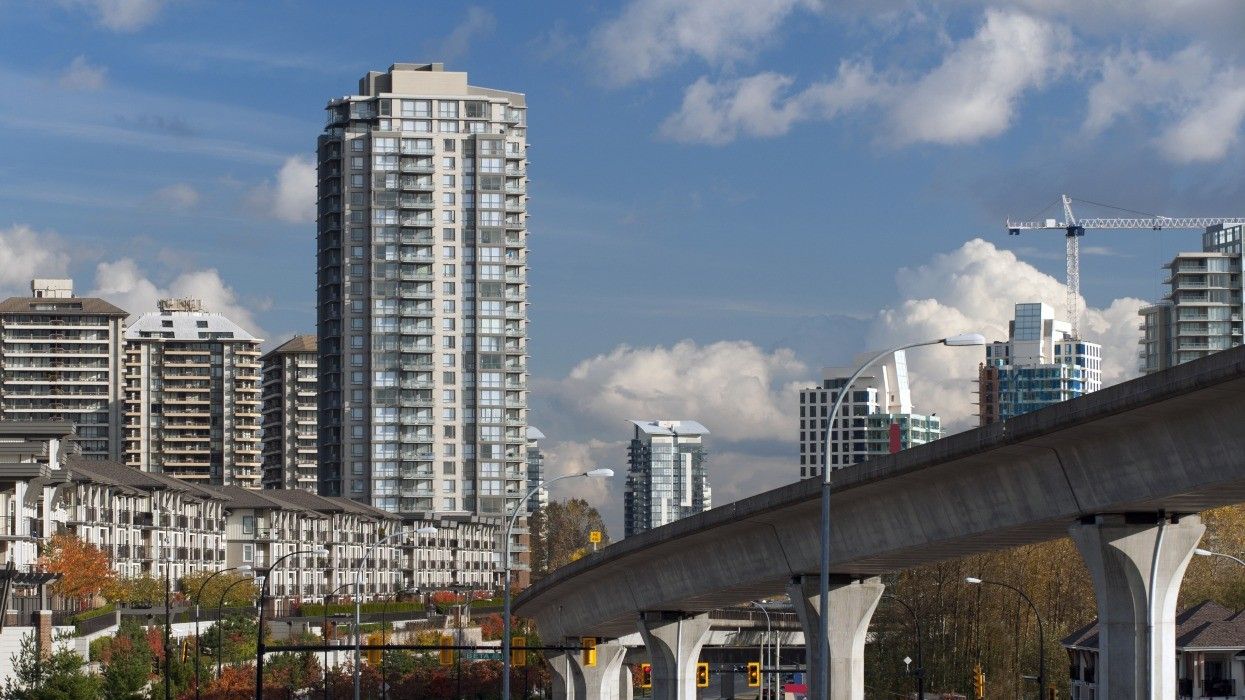Residential buildings near SkyTrain tracks in Burnaby.