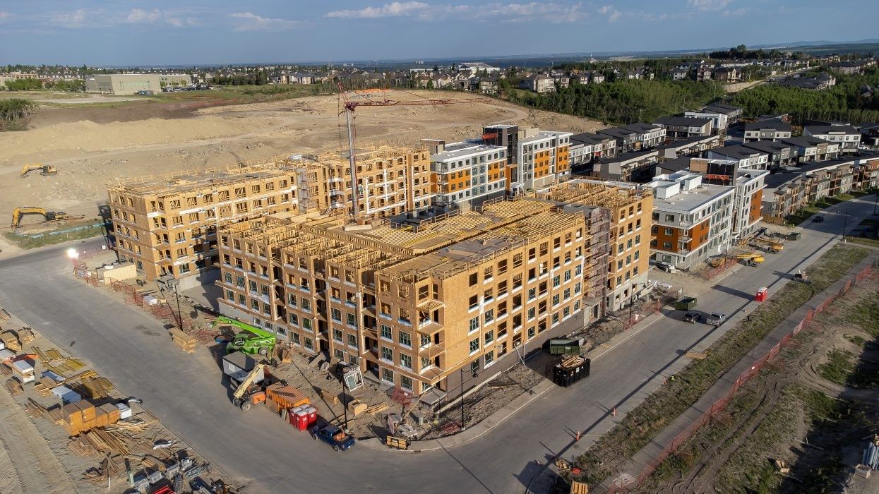Residential buildings under construction in suburban Calgary in 2023.