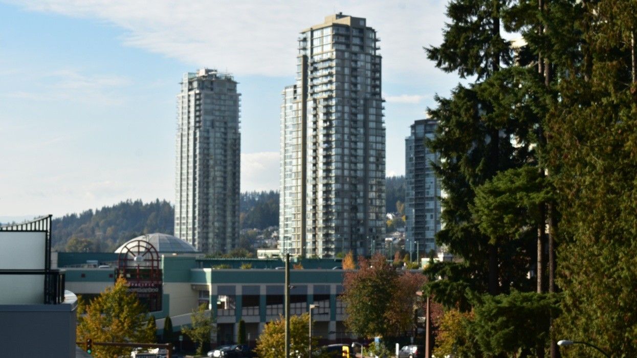 Residential towers looming over Henderson Place Mall in Coquitlam.