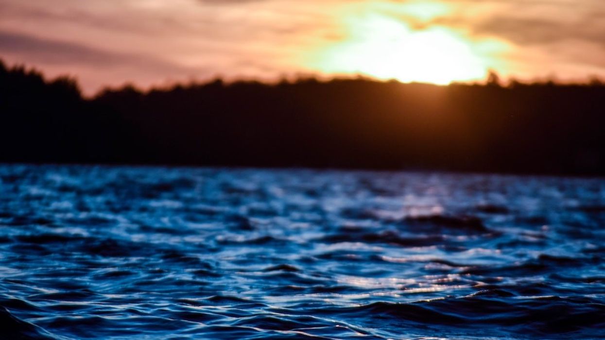 Rough waters with sunset in the background