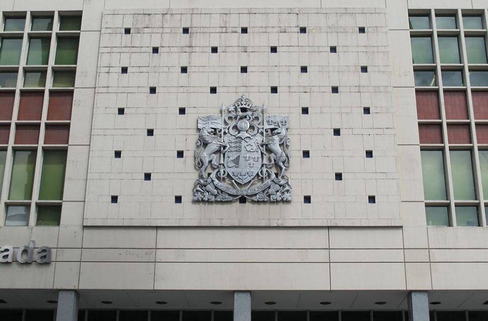 Royal Coat of Arms of Canada Emblem on the Main Post Office building in Vancouver.