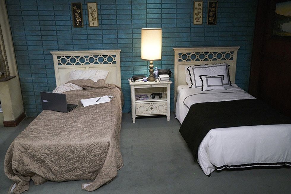 The iconic turquoise wall in the bedroom of the adult Rose siblings in CBC's Schitt's Creek was envisioned by Dan Levy after he saw it in a real life motel from around 1955.