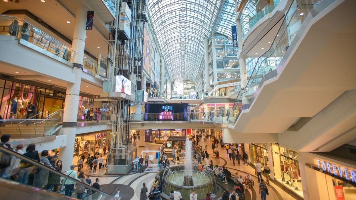 The interior of the bustling CF Toronto Eaton Centre shopping centre.
