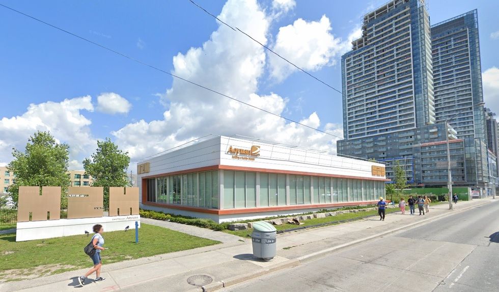 The M2M Condos presentation centre at 5915 Yonge Street, with Phase One in the background, in July 2023.