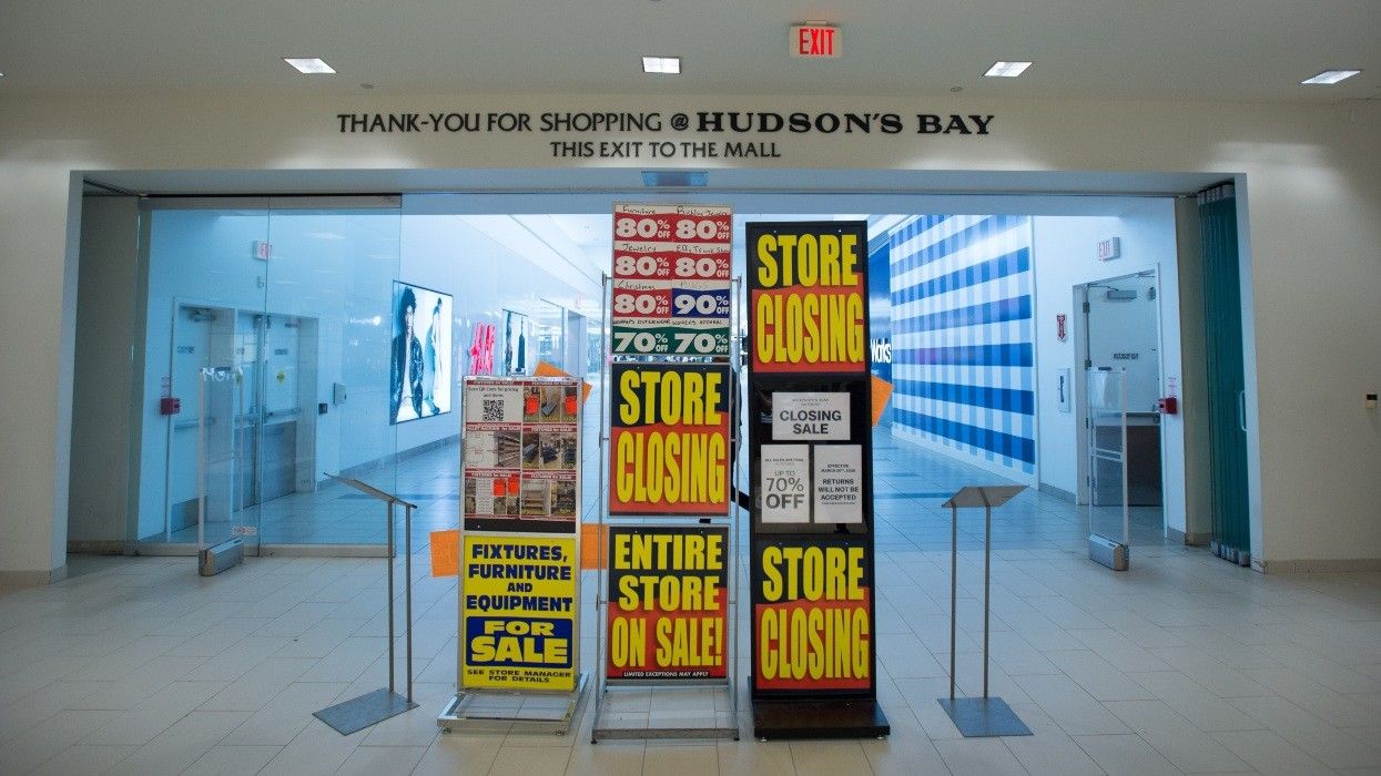 The main exit of a Hudson's Bay store amidst liquidation sales.