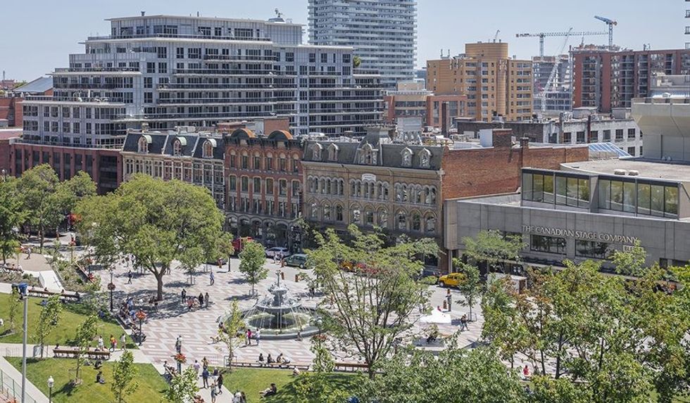 Toronto's new Berczy Park, which boasts one of the city's most stunning fountains, is a lovely place to meander through, perch for an ice cream cone with the kids or while away a good few hours relaxing. \u00a0(Photo courtesy by Industrious)