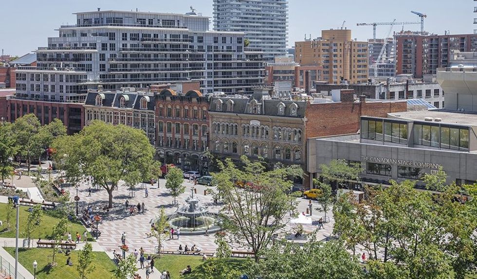 Toronto's new Berczy Park, which boasts one of the city's most stunning fountains, is a lovely place to meander through, perch for an ice cream cone with the kids or while away a good few hours relaxing. (Photo courtesy by Industrious)