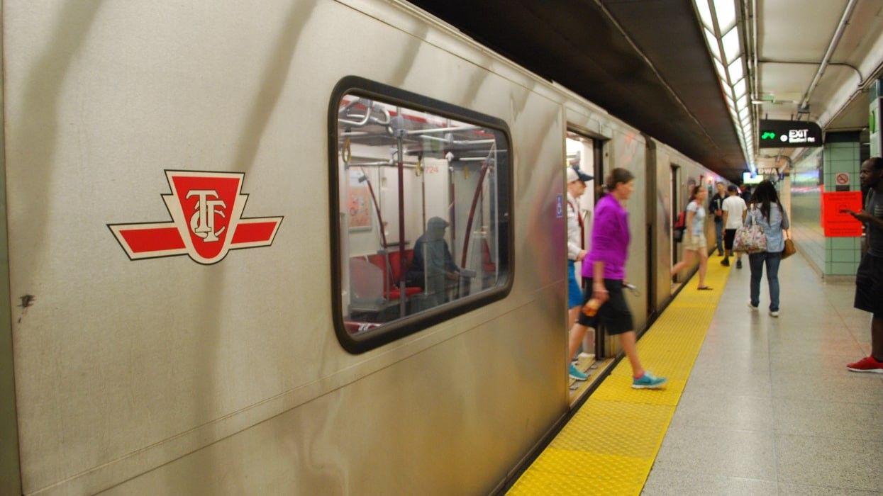 TTC subway riders exiting a train.