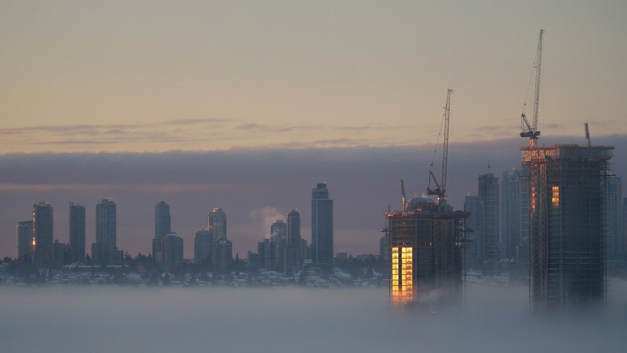Two high-rise buildings under construction in Burnaby.