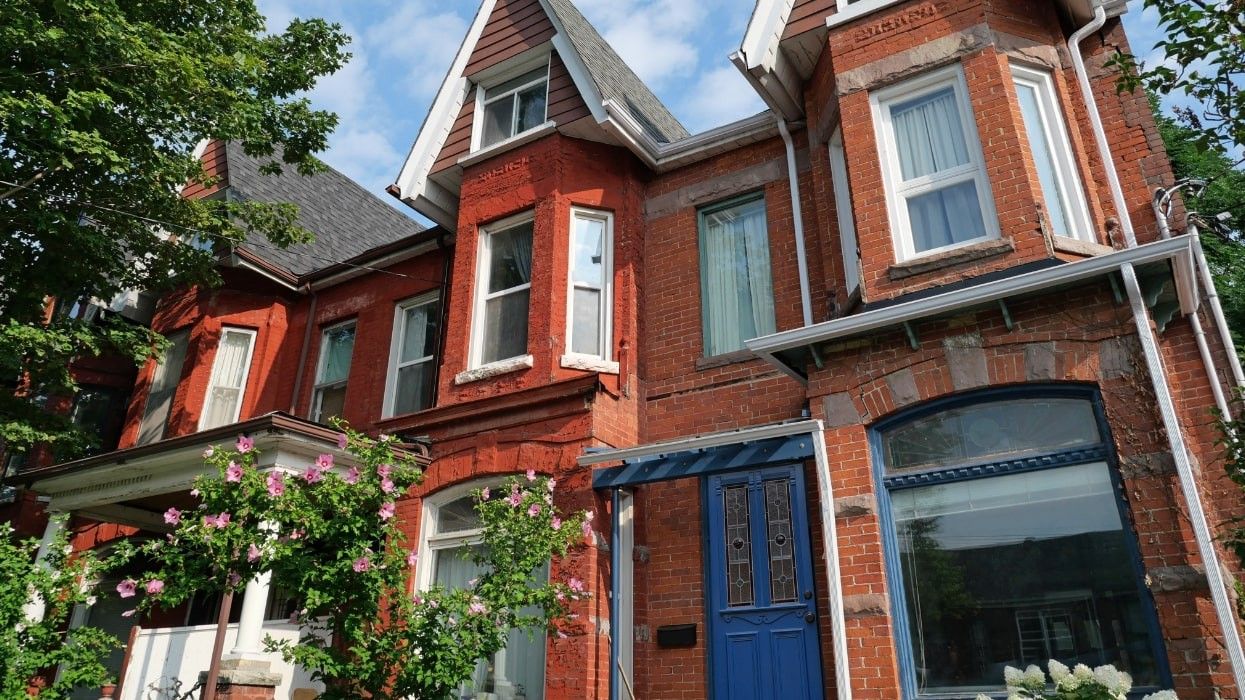 Victorian row houses in Toronto during the summer.