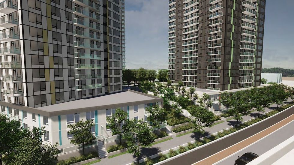 View of Tower 1A (right) and Tower 1B (left) from along Lougheed Highway.