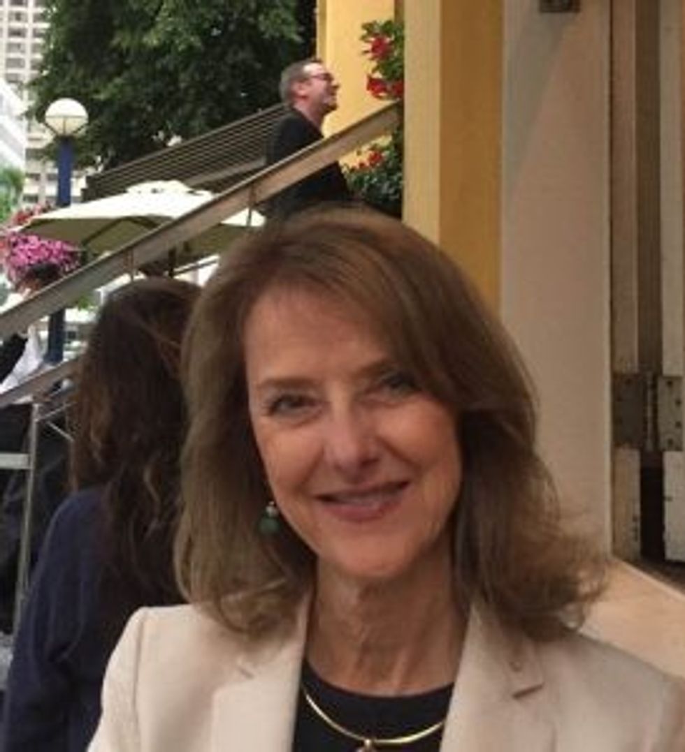 Vivien Sharon in Yorkville, along with Kiefer Sutherland in the background.