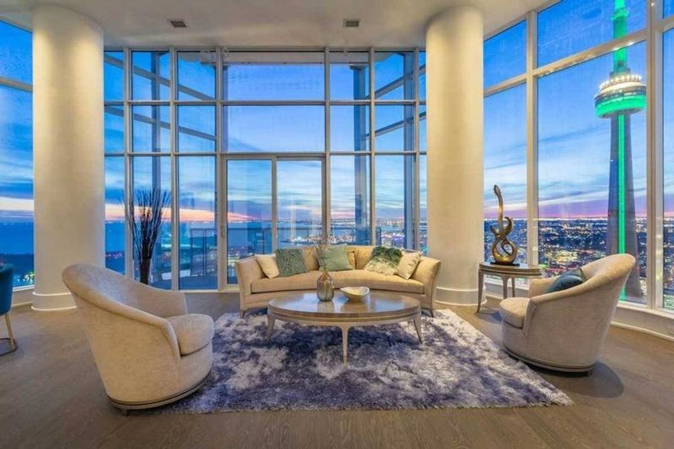 Image showcasing Listed: Downtown Penthouse Suite Offers Sweeping CN Tower Views