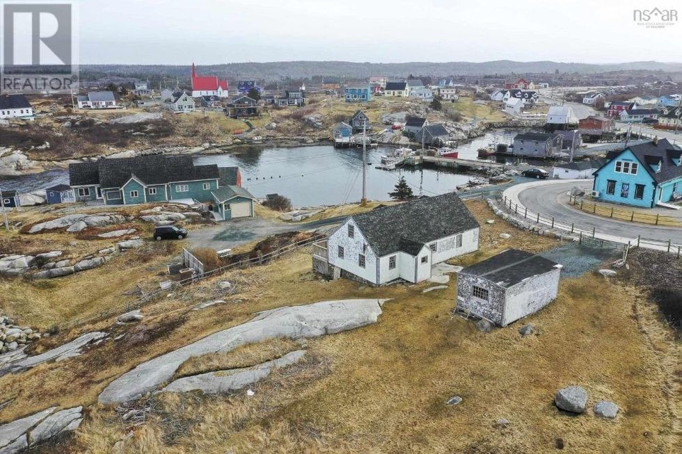 FixerUpper For Sale Next to Iconic Peggy's Cove Lighthouse